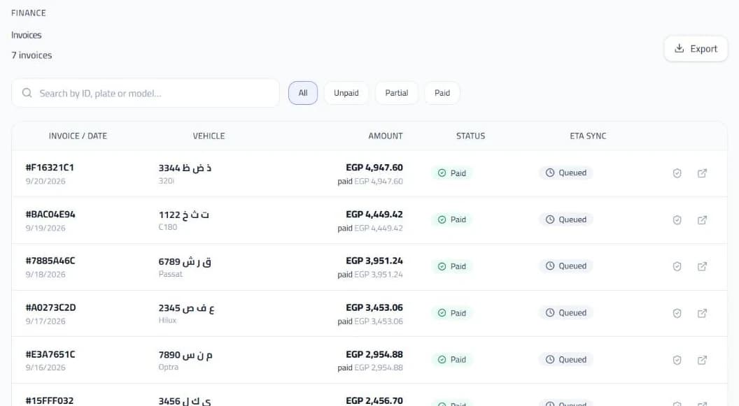 AutoQare invoices with amounts in EGP, payment status and an ETA e-invoice sync column